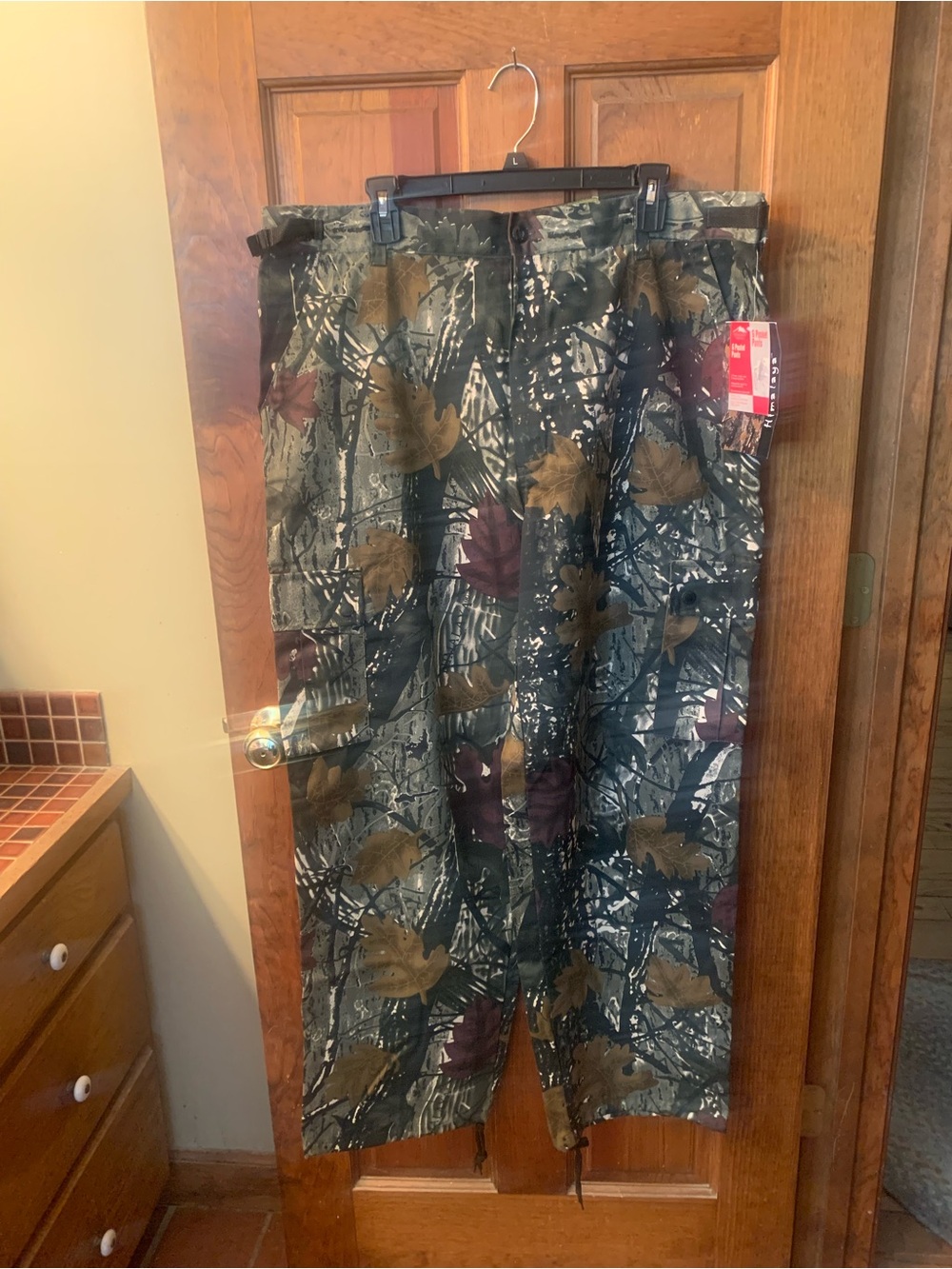 Northwest Territory, NEW WITH TAGS, MENS camouflage hunting pants. Size XL.